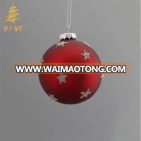 Red glass ball ornament with many kinds of design on surface for Christmas decoration